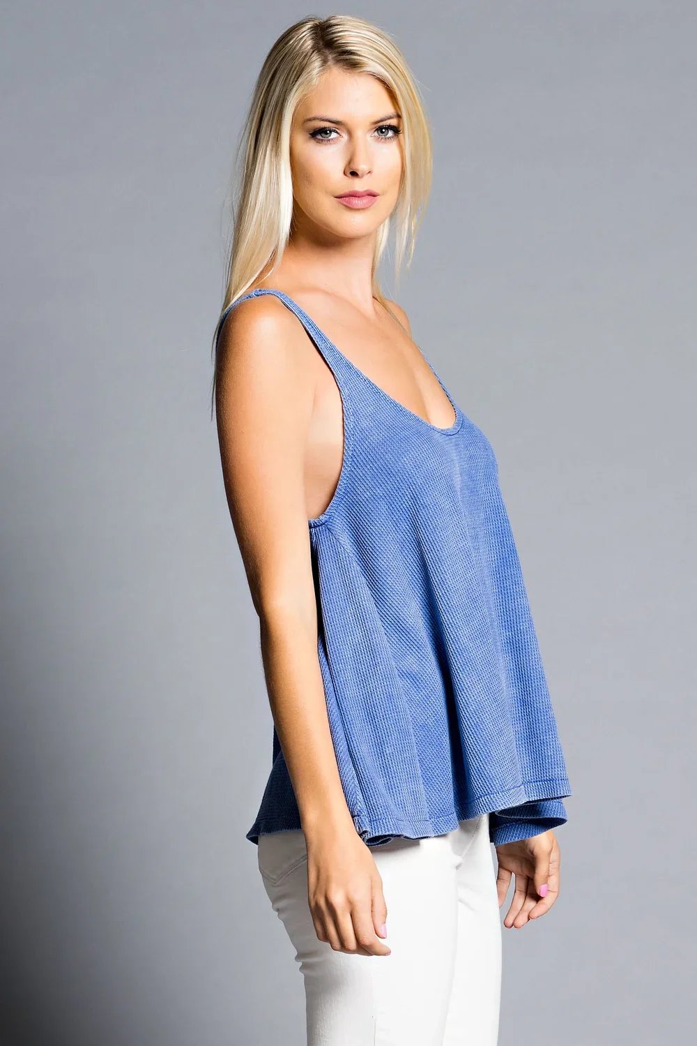 Blue sleeveless top and white trousers - Overseas garment factory