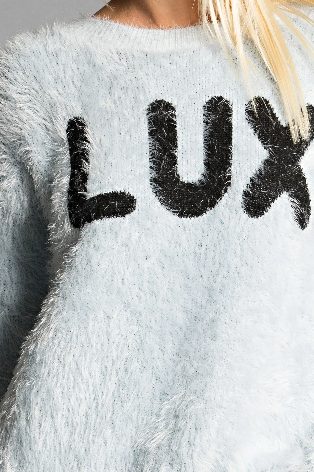 Fuzzy bouclé knit sweater with intarsia lettering custom manufacture